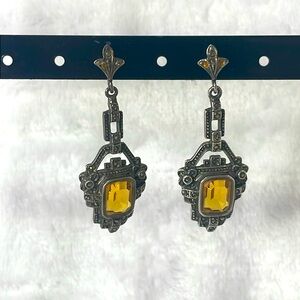 Vintage Art deco dangle earrings with amber glass and marcasite.